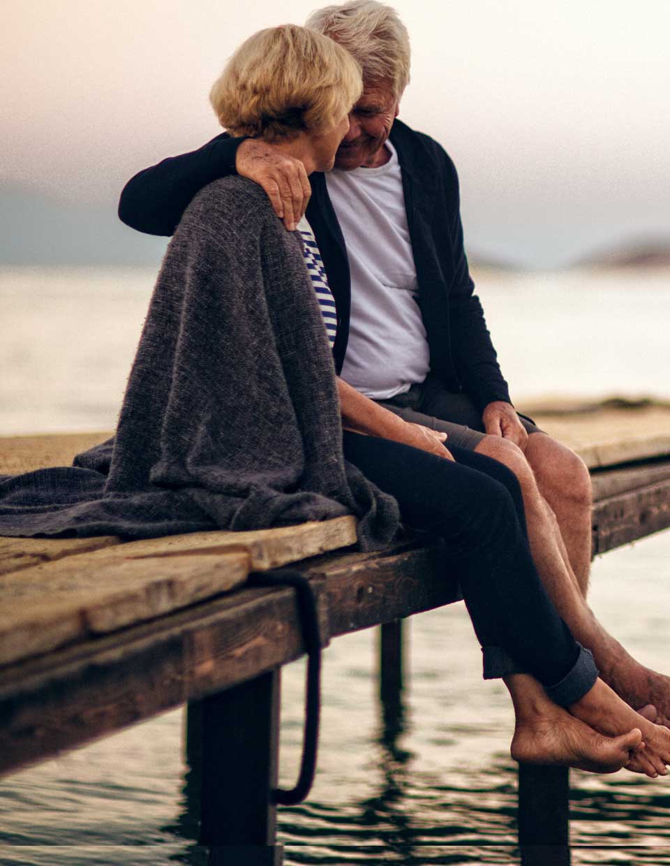 promo image for retired couple on a pier 